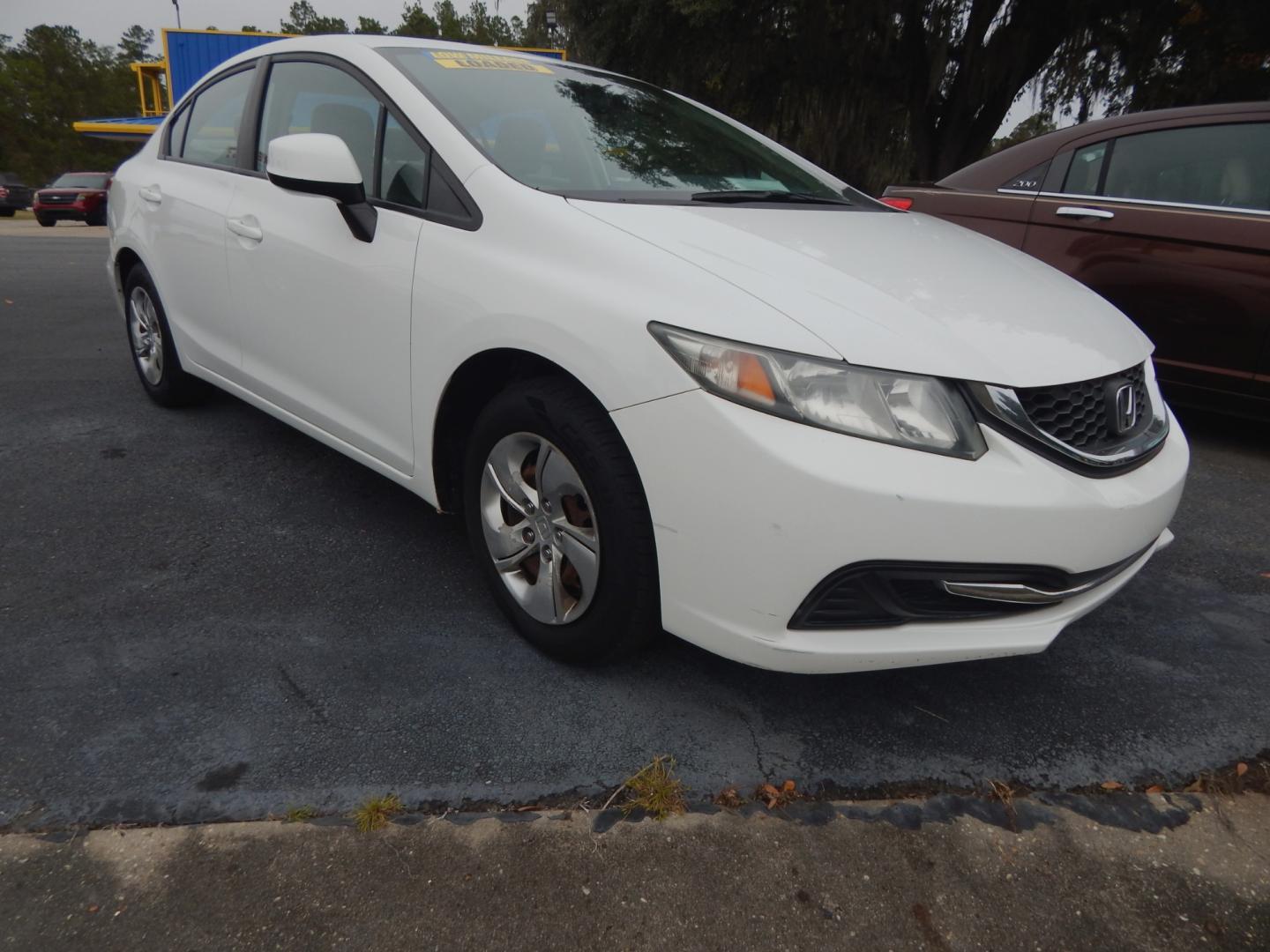 2013 White /Tan Honda Civic LX (19XFB2F57DE) with an 1.8L -4 cyl. engine, Automatic transmission, located at 3120 W Tennessee St, Tallahassee, FL, 32304-1002, (850) 575-6702, 30.458841, -84.349648 - Used Car Supermarket is proud to present you with this loaded immaculate 2013 Honda Civic LX sedan with low miles. Used Car Supermarket prides itself in offering you the finest pre-owned vehicle in Tallahassee. Used Car Supermarket has been locally family owned and operated for over 48 years. Our Ci - Photo#1